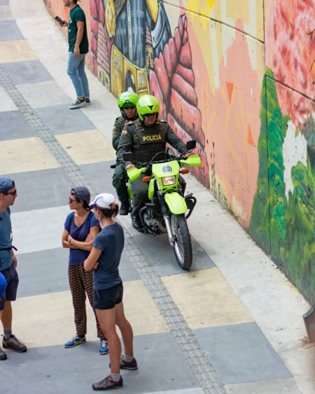 homicides in Medellin are prevented by a large police presence.